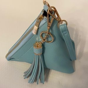 Triangular baby blue wristlet handbag